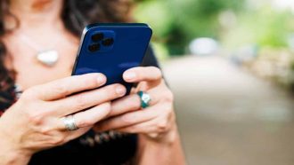 Close up of woman with smart phone