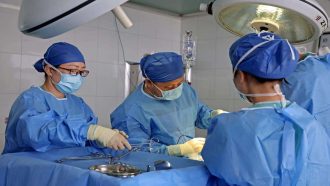 ZAOZHUANG, CHINA - AUGUST 19, 2024 - A chief doctor performs a cesarean section on a pregnant woman in the operating room of the Maternity and Child Health Hospital in Zaozhuang, East China's Shandong province, Aug 19, 2024. (Photo credit should read CFOTO/Future Publishing via Getty Images)