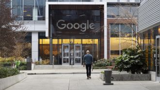 Seattle, WA, USA - Dec 21, 2023: A Googler walks back to Google's South Lake Union office in Seattle, Washington.